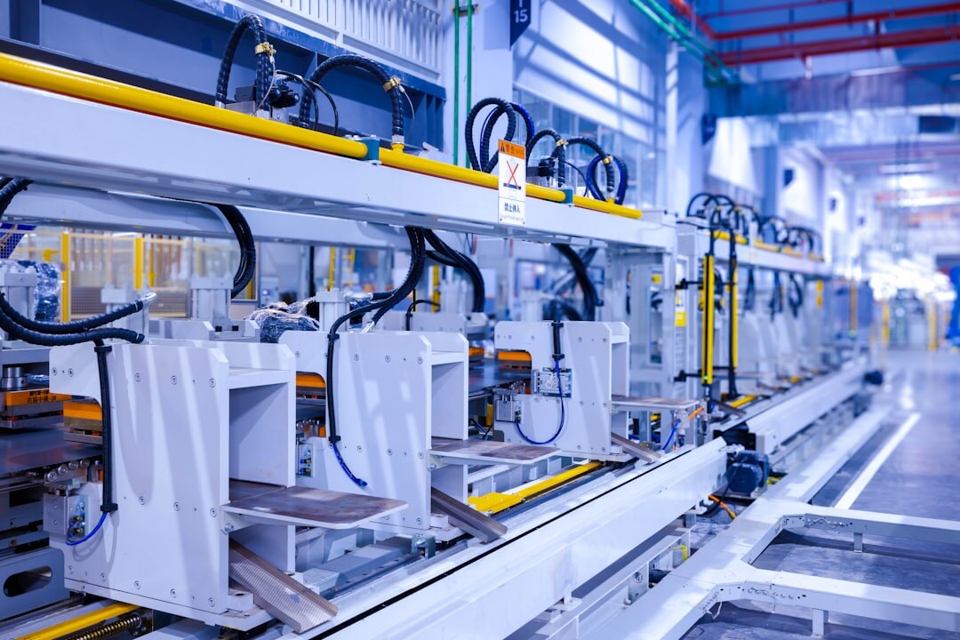 Industrial robot arm working in a factory